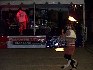 The Fire Dancer entertainment between events at the Lincolnville Festival 2009